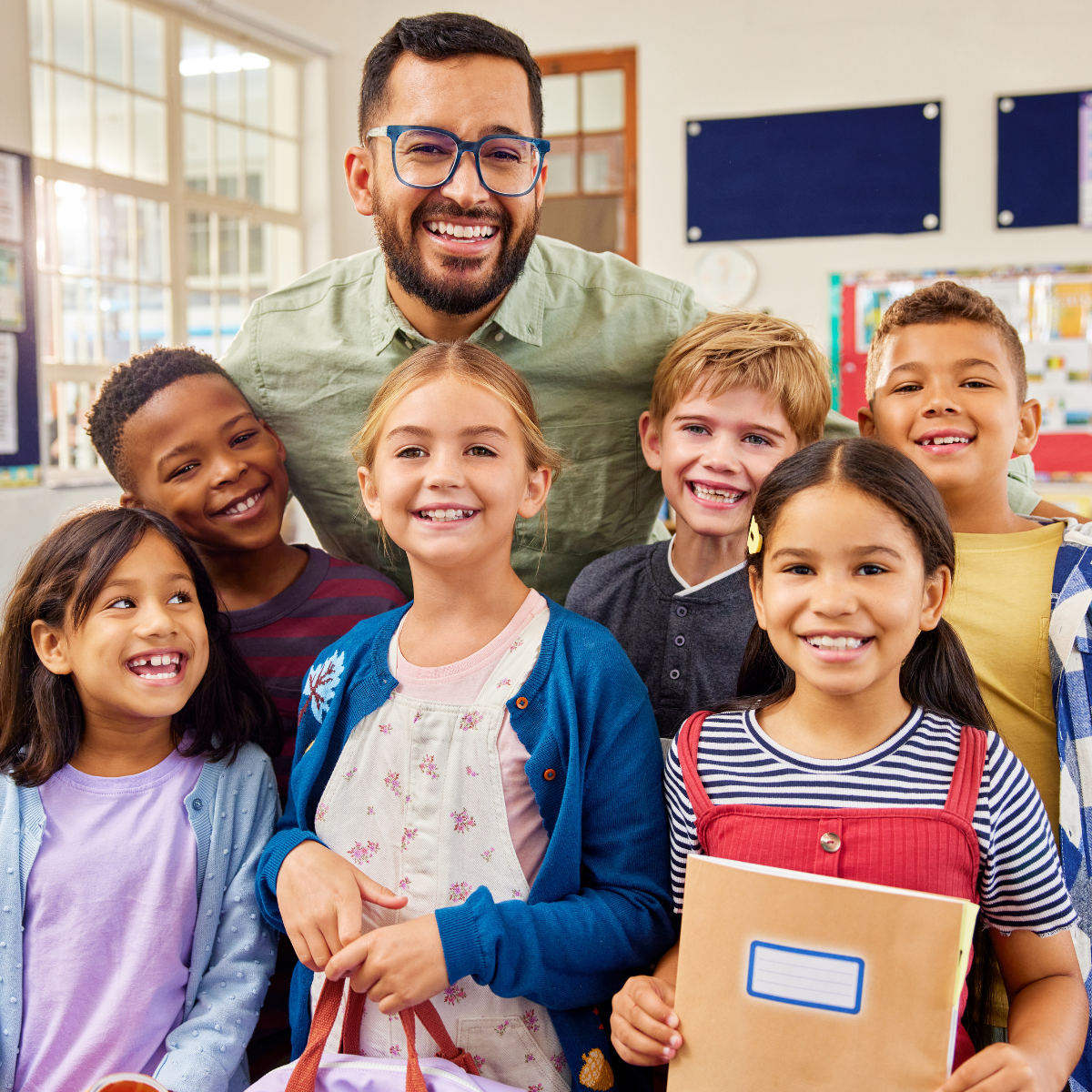 Travel occupational therapist helping student in a special education classroom during back-to-school season