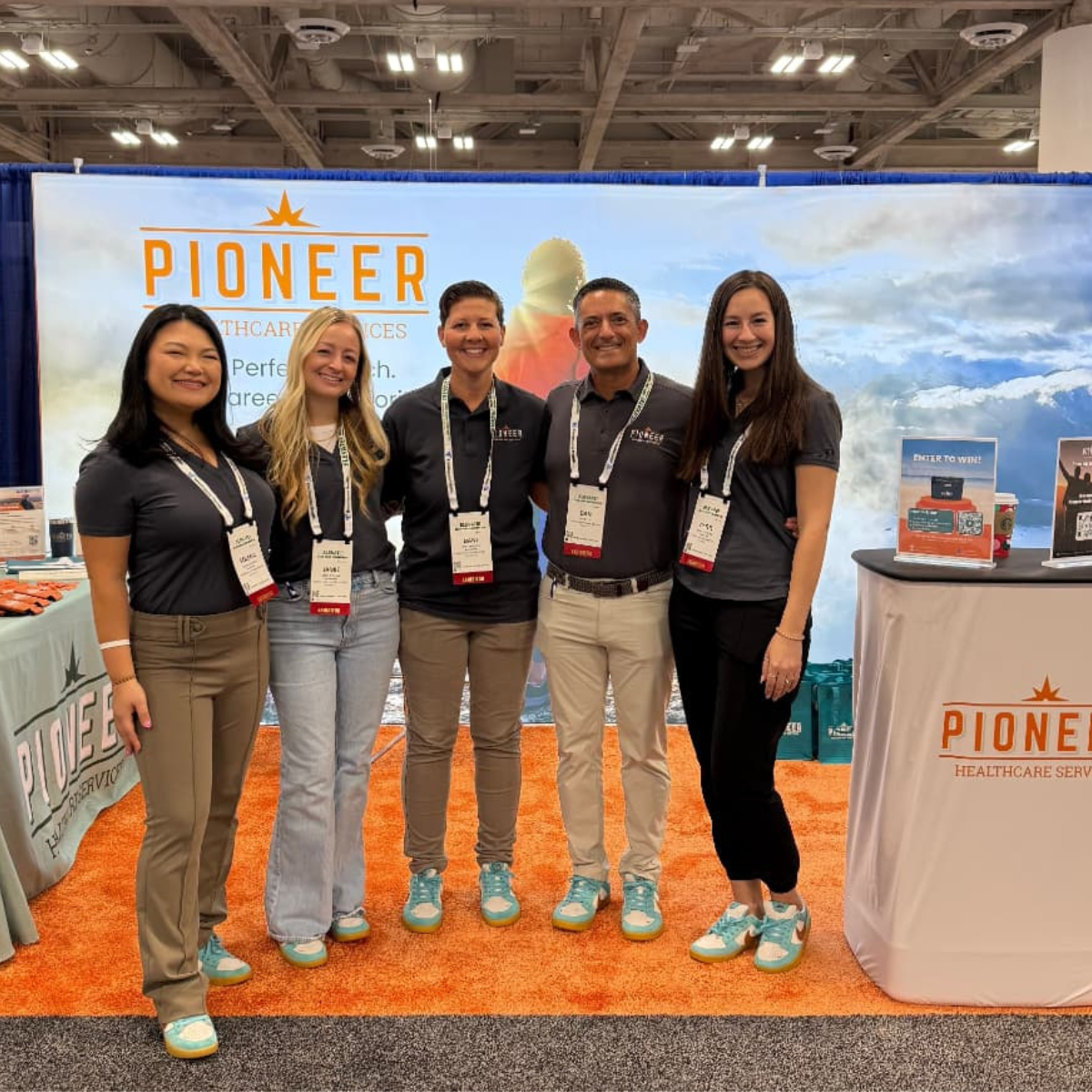 Pioneer Healthcare team at their booth during the AOTA Conference 2025, connecting with occupational therapists