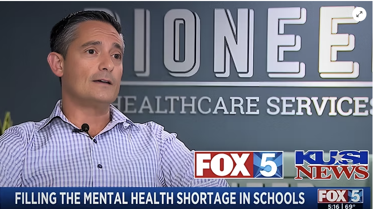 School-based mental health professional supporting a student through one-on-one counseling