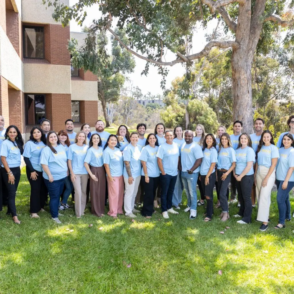 Pioneer Healthcare Services team group photo during rebrand launch event